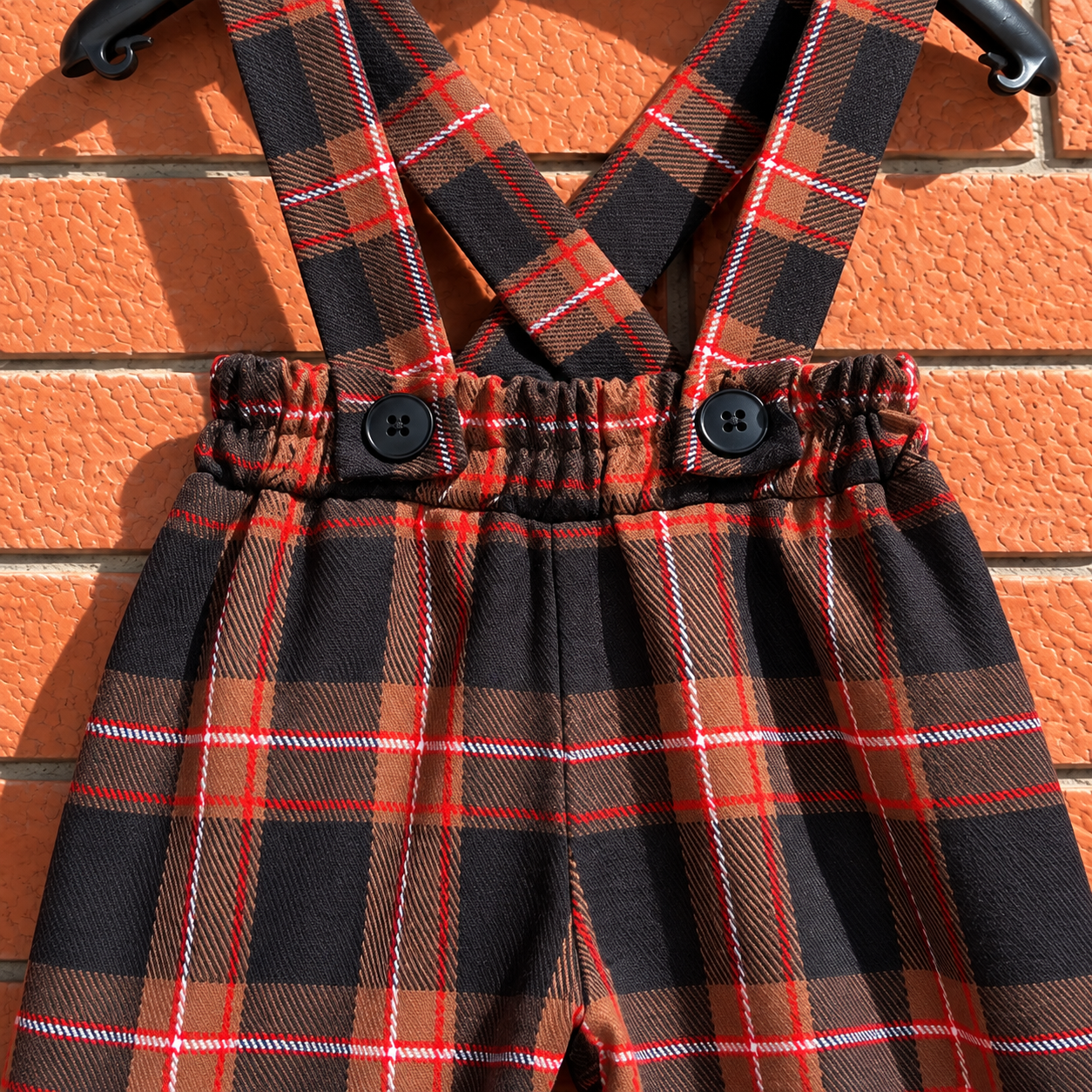 Brown tartan trousers for children