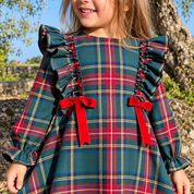 Tartan dress with a green background